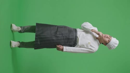 Full Body Of Man Chef Thinking And Looking Around Then Raising His Index Finger In The Green Screen