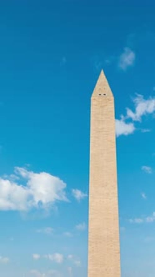 Washington monument time lapse on a clear sky day with cloud, Washington D.C. USA.