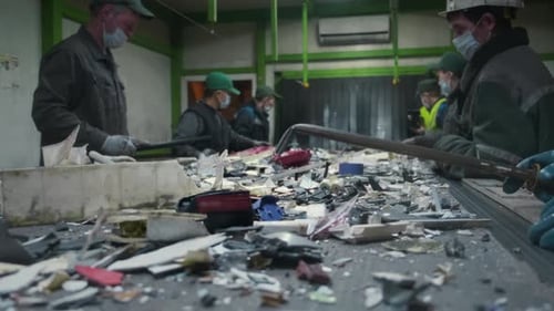 Men of Garbage Processing Plant Sort Trash Male Workers Sort Recycle Metal Plastic Waste Factory