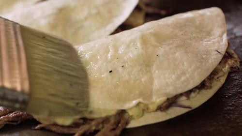 Tacos Being Basted on Grill Close Up