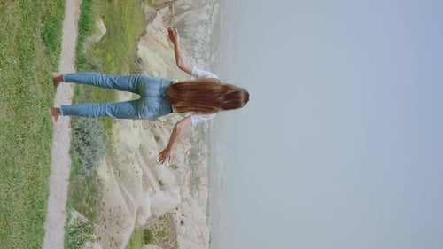 Concept Freedom Woman Traveler Standing on Hill Slope in Daytime Enjoy