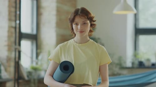 Portrait of Girl with Yoga Mat