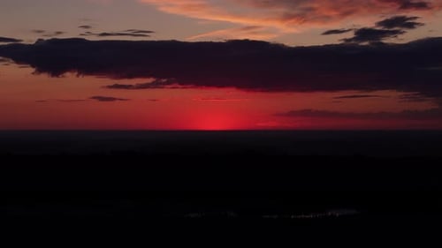 Aerial View of Stunning Orange-Red Sunset Sky