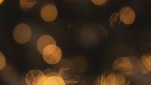 Blurred Golden Bokeh Lights Background for Festive Holiday Projects