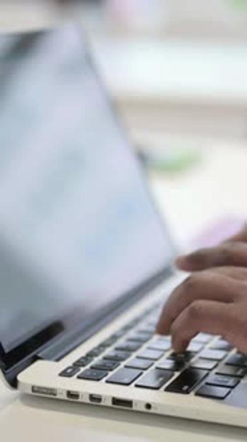 Side View of Hands of Businessman Typing on Laptop, Close up, Vertical Video