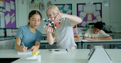 Students Studying Molecular Model in Science Class