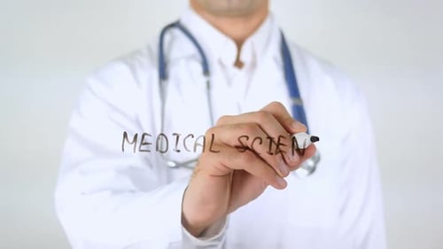 Doctor Writes Medical Science on Glass