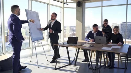 Group of business people working together, brainstorming in office