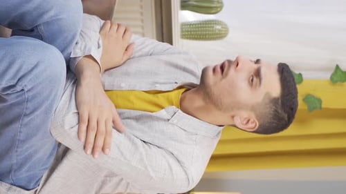 Vertical video of Stressed man.