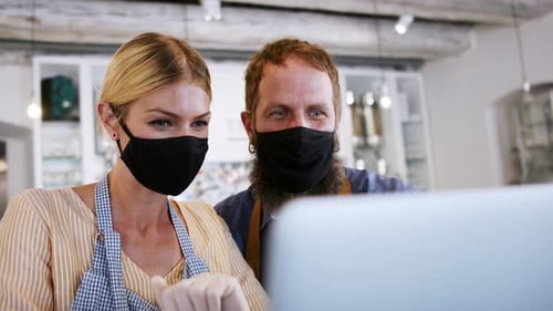 Coffee Shop Owners with Face Masks, Lockdown, Quarantine, Coronavirus, Back to Normal