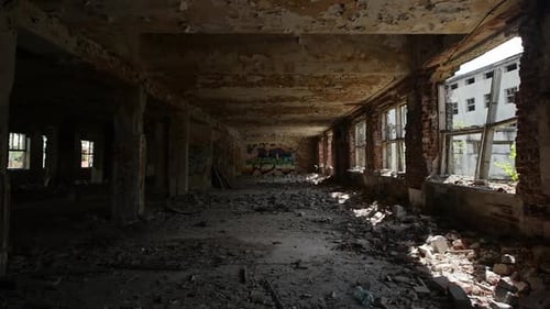 Destruction and debris in crumbling halls, abandoned scary place - urban exploration (slow motion)