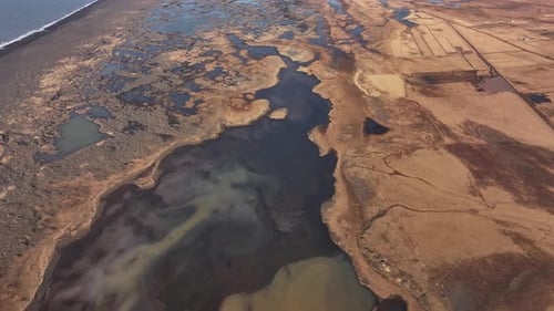 Aerial view of Þjórsá river delta in Iceland - stunning wetlands and coastline 4K