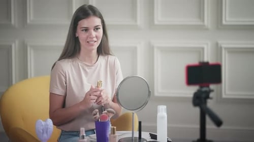 Woman Applies Makeup for Video Tutorial