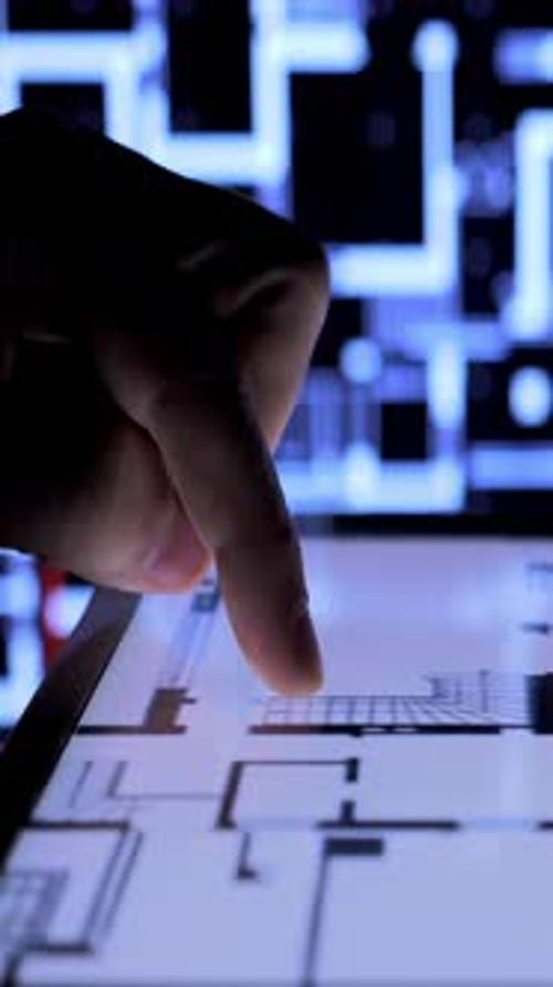 Looking Blueprints On Tablet