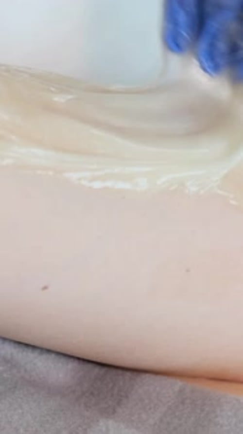 Delicate Bright Depilation in a Cosmetology Office Waxing Master Vertical Video