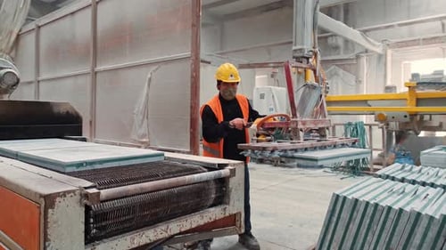 Manipulación industrial de losas de mármol