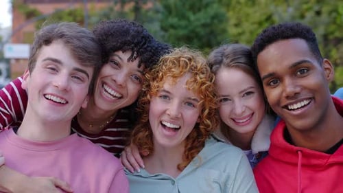 College Student Friends Smiling at Camera Posing for a Group Portrait at Campus