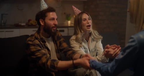 Friends Celebrating Birthday Together at Home