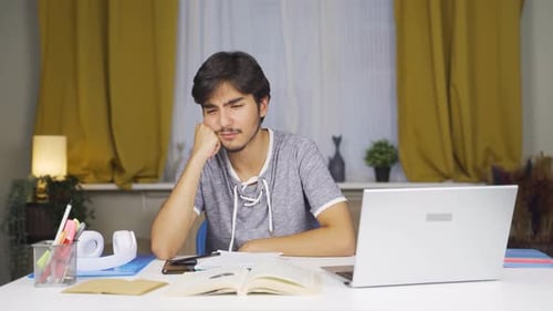 Depressed male student.