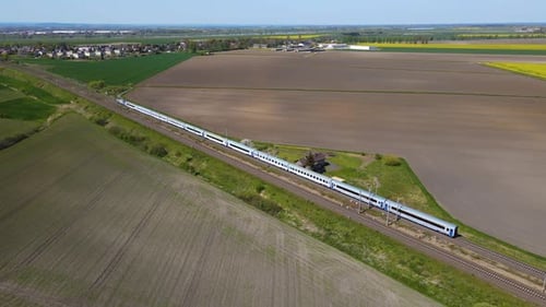 Fast High Speed Passenger Train Electric Locomotive Driving on Railroad