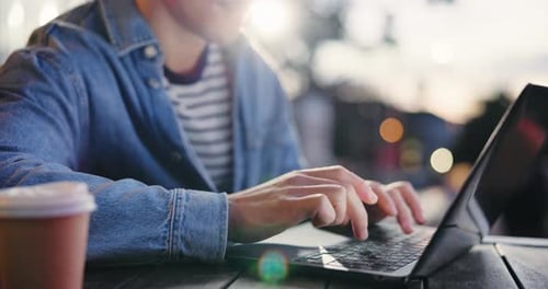 Hands, man and typing on laptop at cafe for remote work, writing story and email feedback