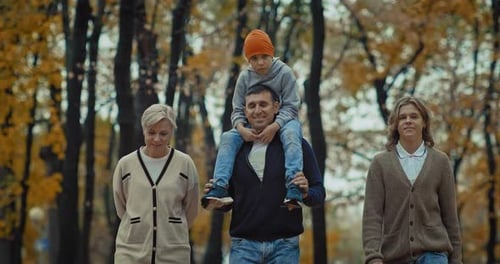 Happy Family Resting in Forest in Autumn Weekend Portrait of Parents and Sons Prores