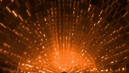 Dynamic orange tunnel with glowing lights, futuristic motion background