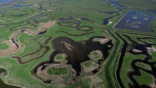 Pullback Over Tollesbury Marina And Salt Marshes In Essex, United Kingdom. Aerial Drone Shot
