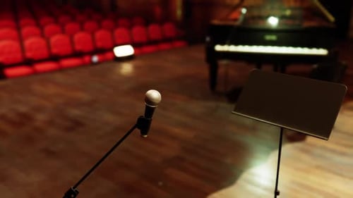 Microphone and Music Stand on a Stage with Piano