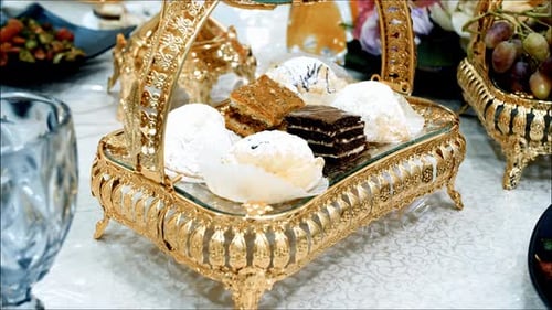 Assorted Desserts on Gold Decorative Tray