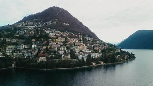 Aerial Footage of Stunning Landscape of Mountains and Lake Lugano Shot in Lugano Switzerland