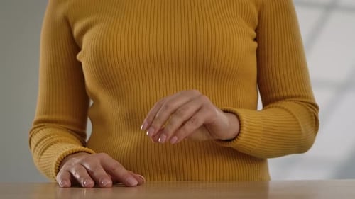 A Woman Snaps Her Fingers