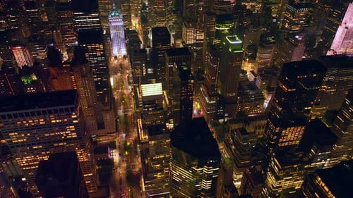 Vibrant New York at night time. Marvelous never sleeping metropolis from aerial perspective.