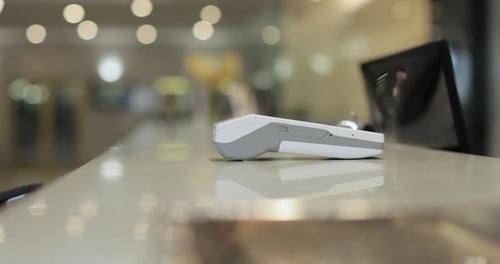 Customer with Mobile Phone Pay for Hotel Reception Payment Client Concierge Service or People at