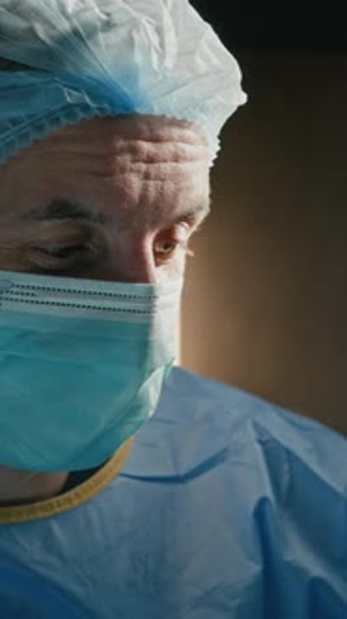 Male Surgeon Communicating with Colleague