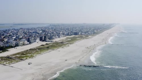 Waves crash along the shoreline of Long Beach Long Island