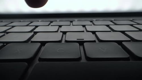 A Program Coder is Typing on Laptop Keyboard Close Up Macro Hacker is Using Computer Man Hands are