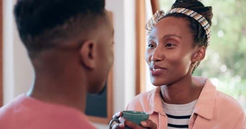 Young Woman Talking and Holding Mug Indoors
