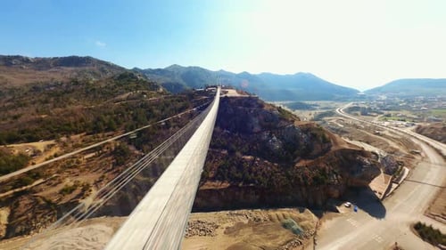 Shooting the suspension bridge with an FPV drone. 4K.