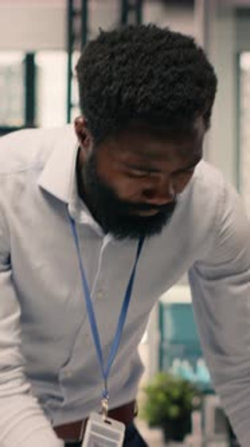 Vertical Video Businessman Working in Modern Office Analyzing Business Intel
