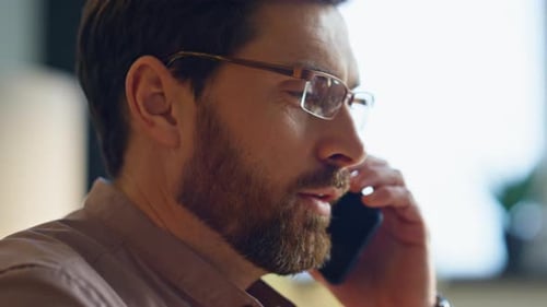 Man Talking on Cell Phone Close Up