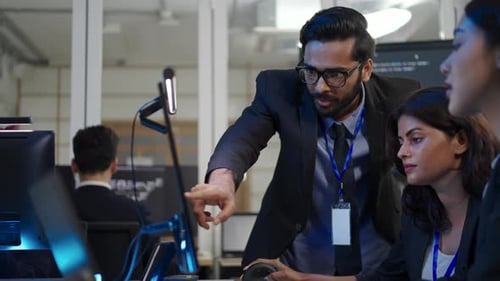 Group of programmers are coding at office.