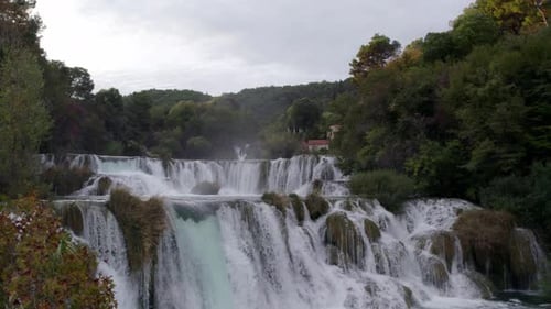 Aerial view of tranquil Krka waterfall in sunrise, Sibenik-Knin, Croatia.