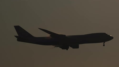 Passenger Airplane Silhouette Before Landing