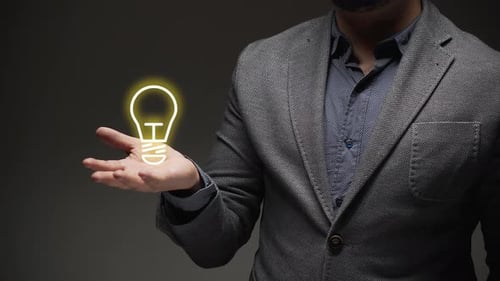 Man Shows Lightbulb Idea