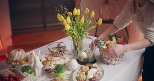 Decorating Festive Table for Easter Holiday Celebration