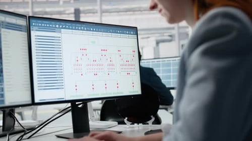 Analyzing PCB Architecture PC Software Close Up and Woman in Factory Office
