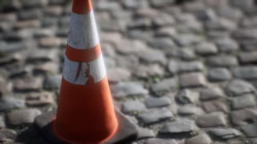 Orange and White Striped Traffic Cone