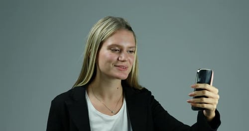 Young Woman Talking on Phone, Close Up
