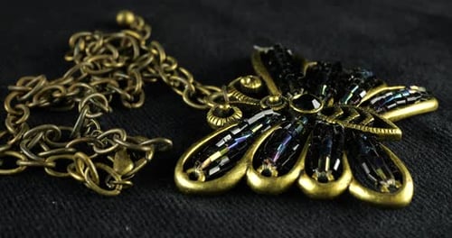 Vintage large pendant in the shape of a butterfly with a bronze-coloured metal chain